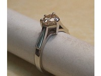 Platinum solitaire ring set with heart shaped diamond