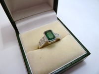 18ct white gold emerald and marquise cut diamond dress ring