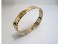 Vintage style white and gold bangle with hand engraving on inside