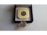 Palladium signet ring seal engraved with crest and motto, showing wax impression