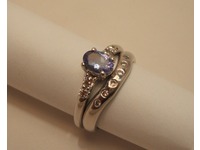 18ct white gold diamond set shaped wedding ring with matching white gold tanzanite and diamond engagement ring
