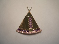 Designed and handmade by us 9ct wigwam brooch set with amethysts and pink sapphires